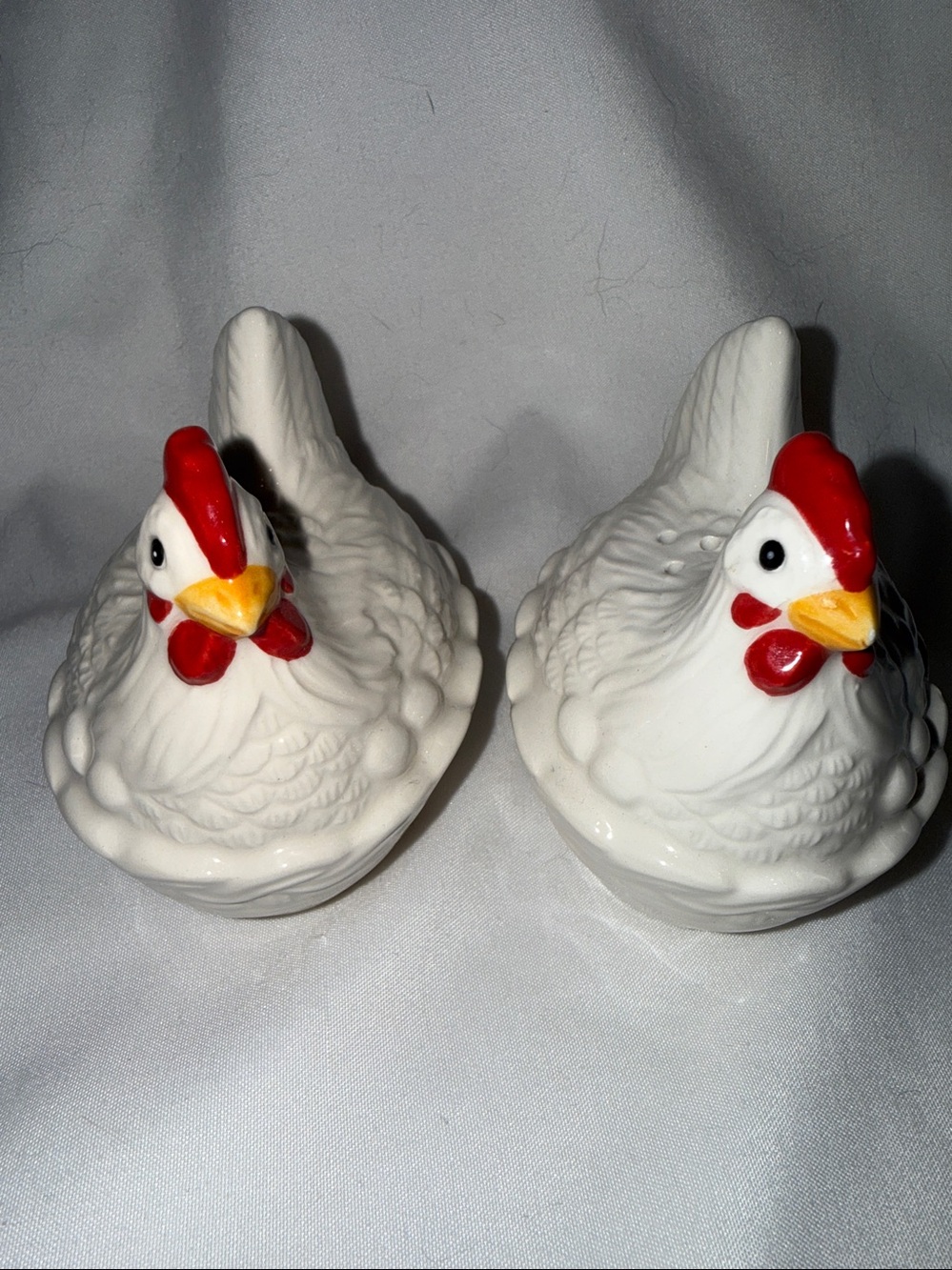 Wilfred White Ceramic Hen Shaker Pair with Red and Yellow Accents